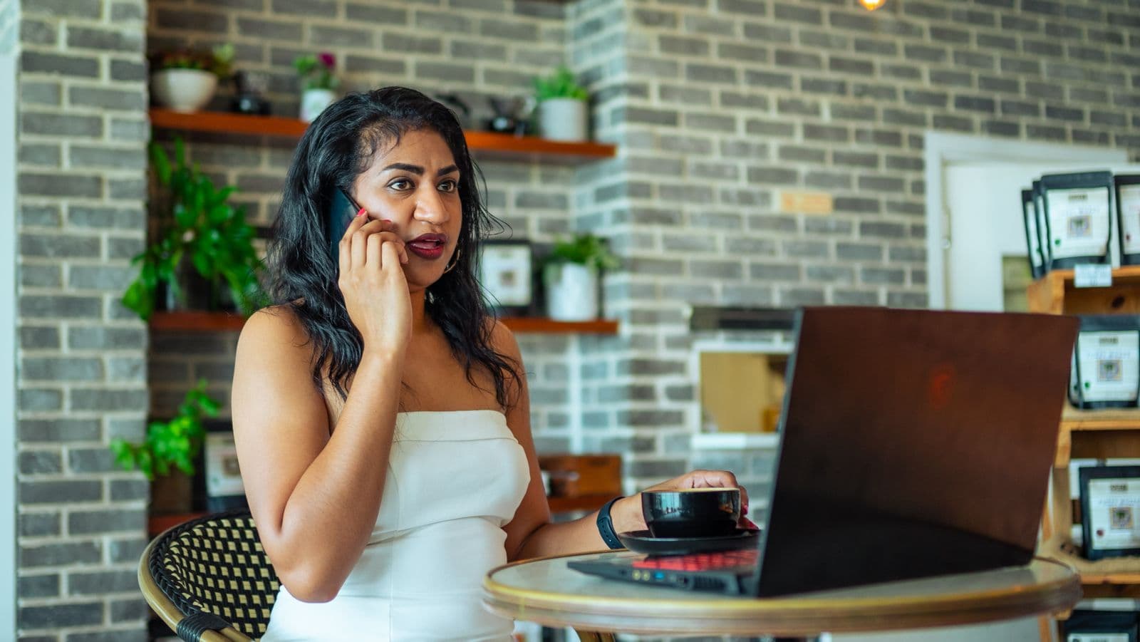 Business owner replying to customers on the go